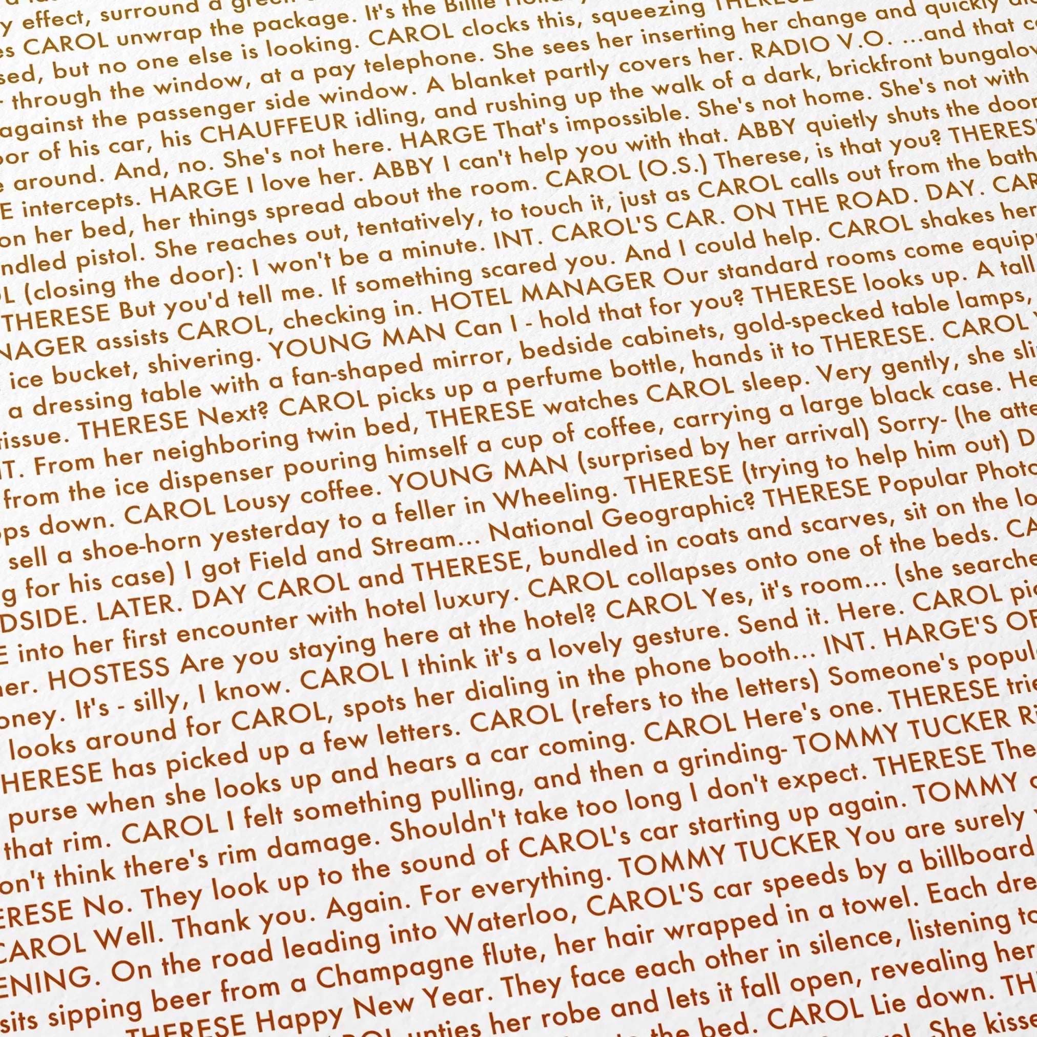 Close-up detail of the Carol movie script poster showing dense typographic text.