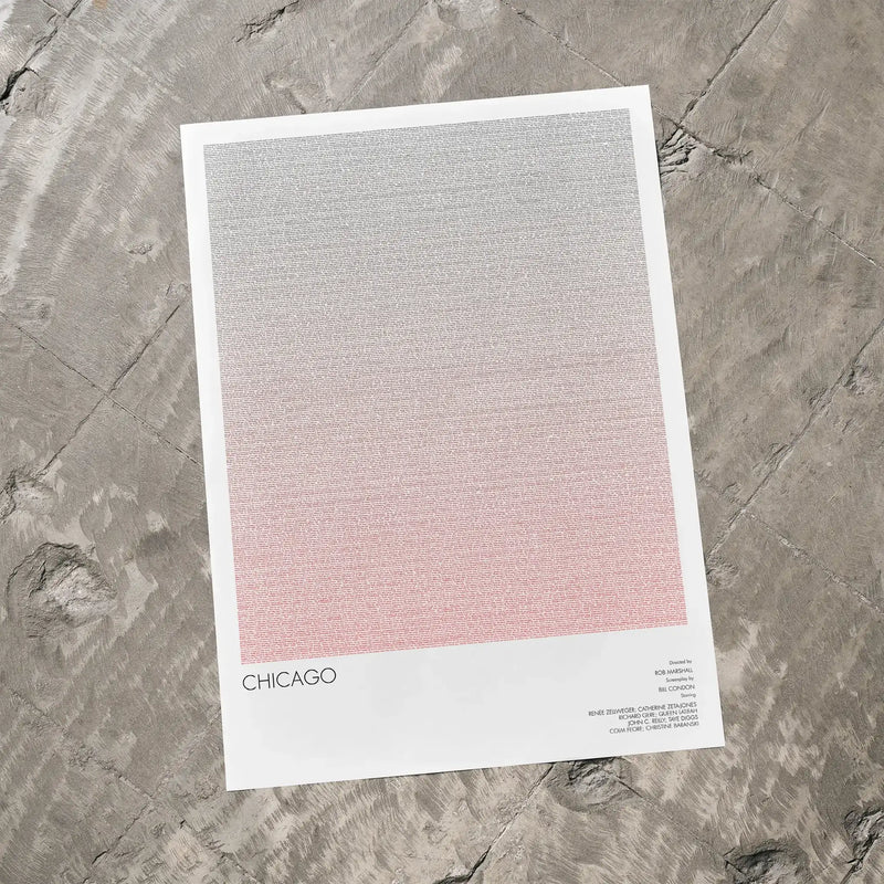 A Chicago movie script poster laid flat on a textured floor surface.