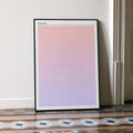 A framed Chicago movie script poster leaning against a wall in a minimalist interior.