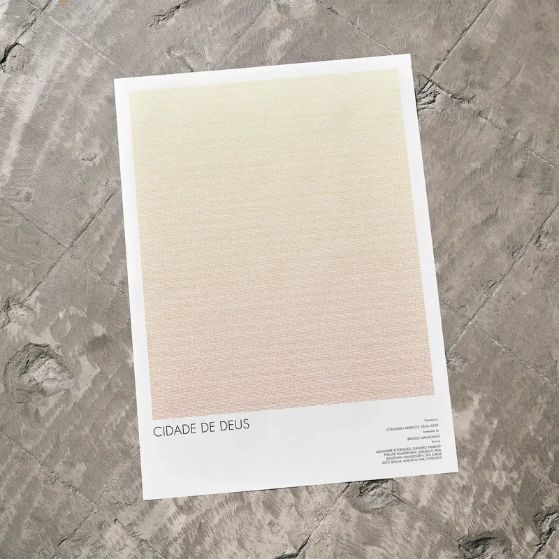 A Cidade de Deus movie script poster laid flat on a textured floor surface.