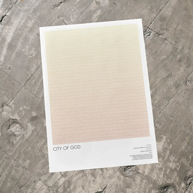 A City of God movie script poster laid flat on a textured floor surface.