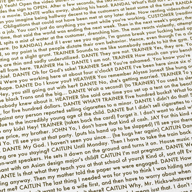 Close-up detail of the Clerks movie script poster showing dense typographic text.