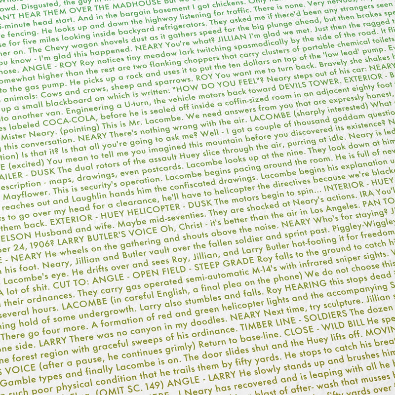 Close-up detail of the Close Encounters of the Third Kind movie script poster showing dense typographic text.