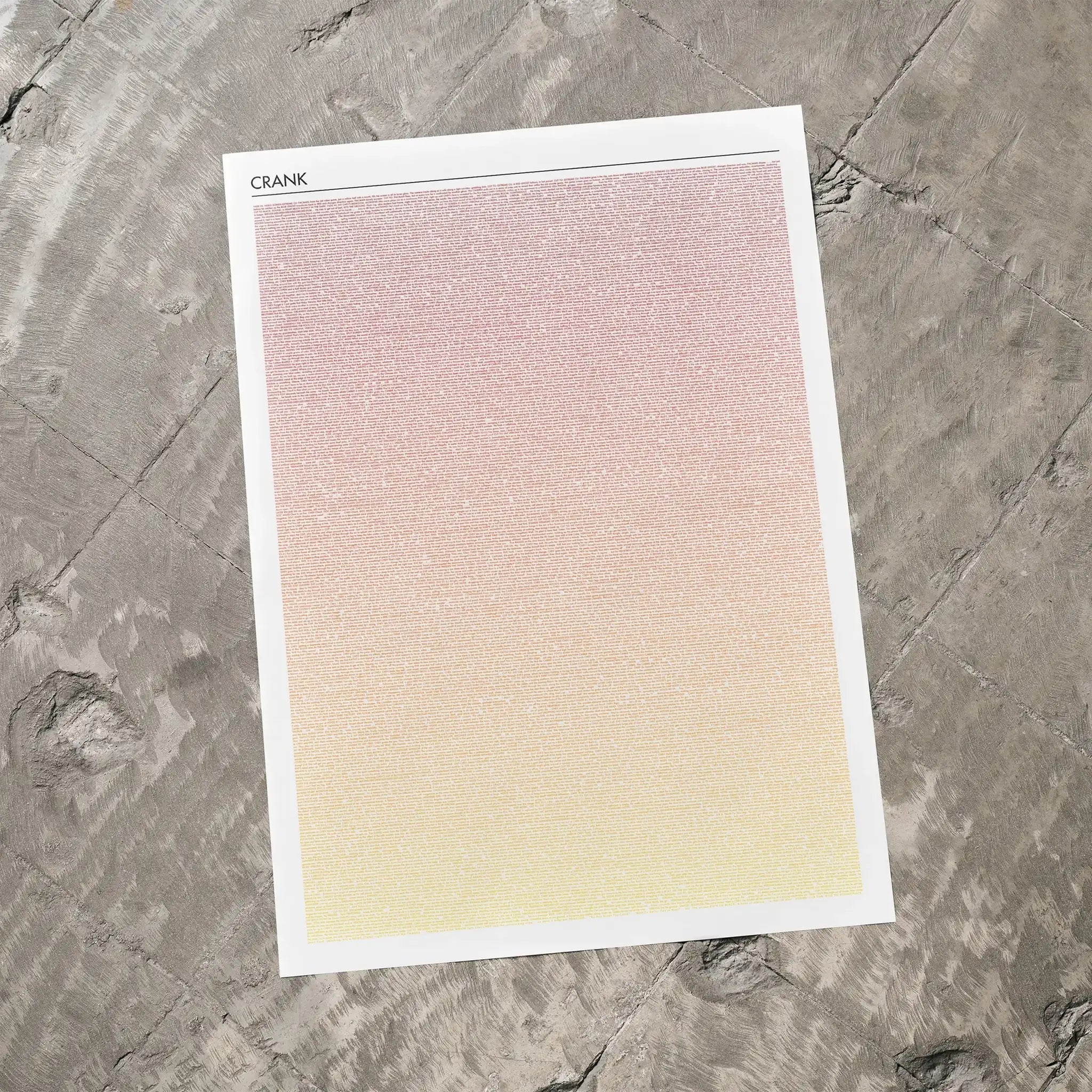 A Crank movie script poster laid flat on a textured floor surface.
