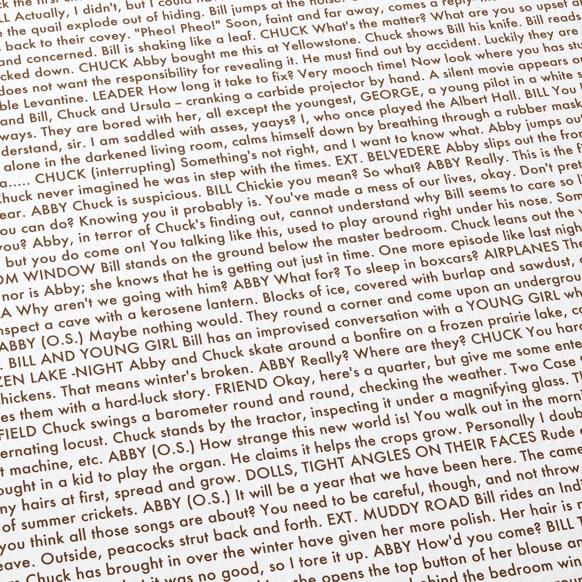 Close-up detail of the Days of Heaven movie script poster showing dense typographic text.