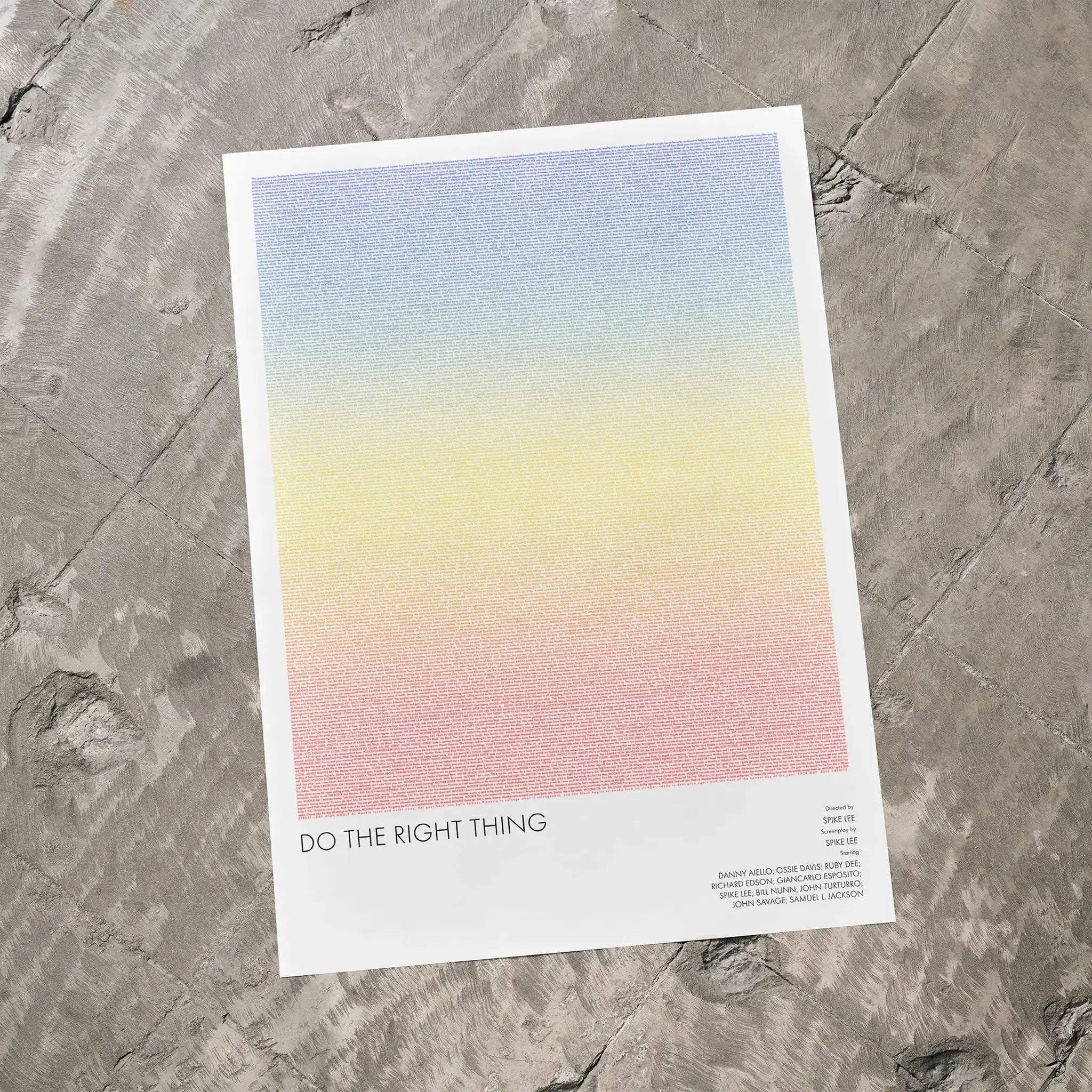 A Do the Right Thing movie script poster laid flat on a textured floor surface.
