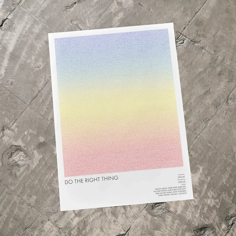 A Do the Right Thing movie script poster laid flat on a textured floor surface.