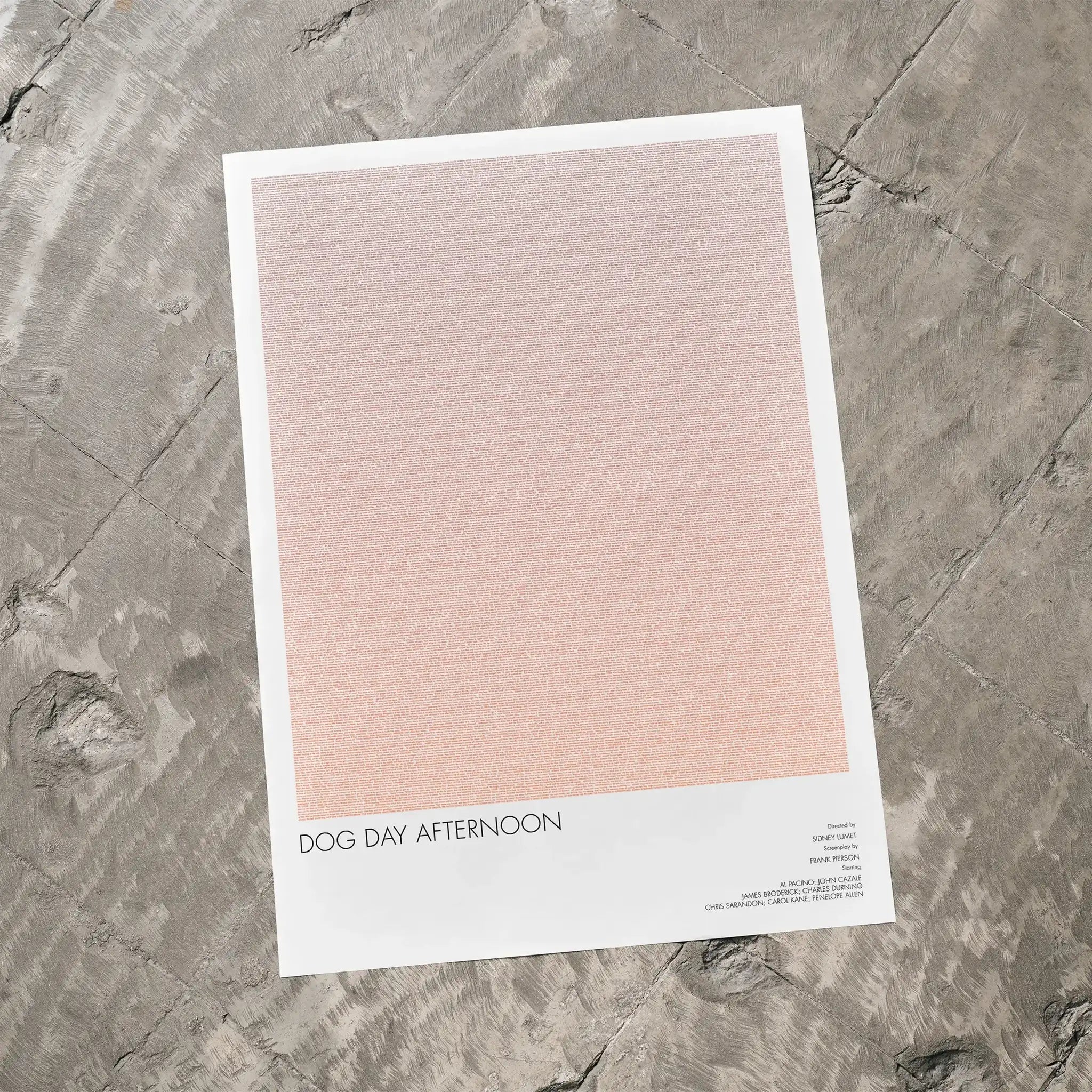 A Dog Day Afternoon movie script poster laid flat on a textured floor surface.