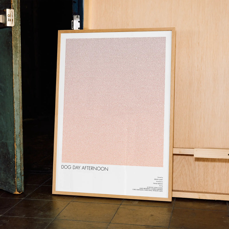 A framed Dog Day Afternoon movie script poster displayed in a contemporary interior setting.