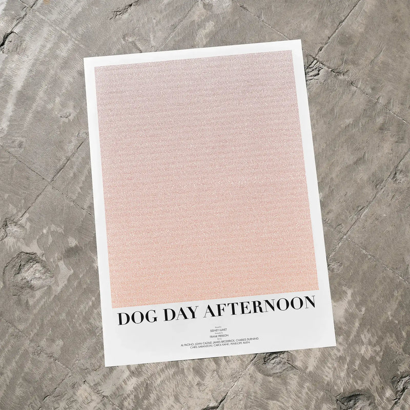 A Dog Day Afternoon movie script poster laid flat on a textured floor surface.