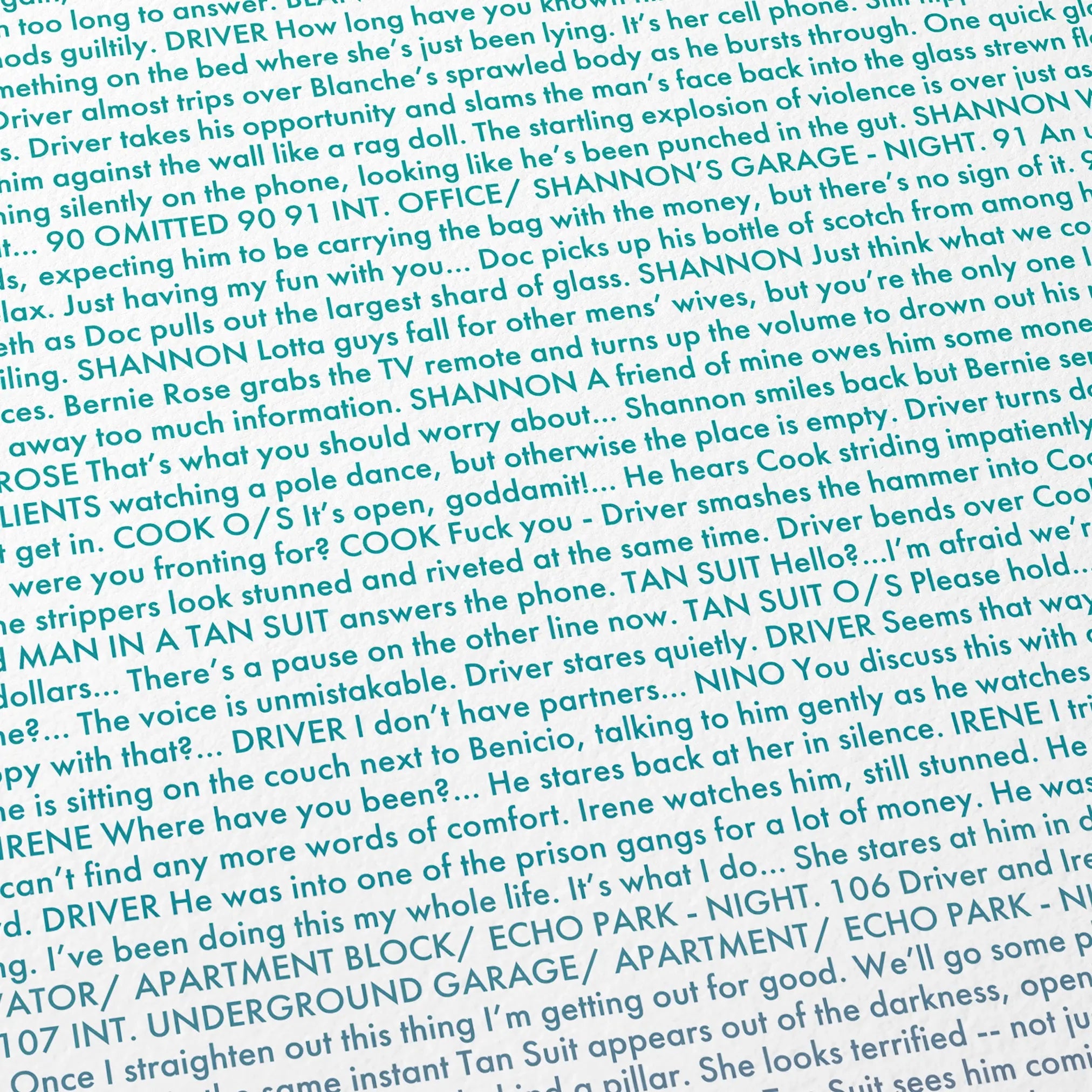 Close-up detail of the Drive movie script poster showing dense typographic text.