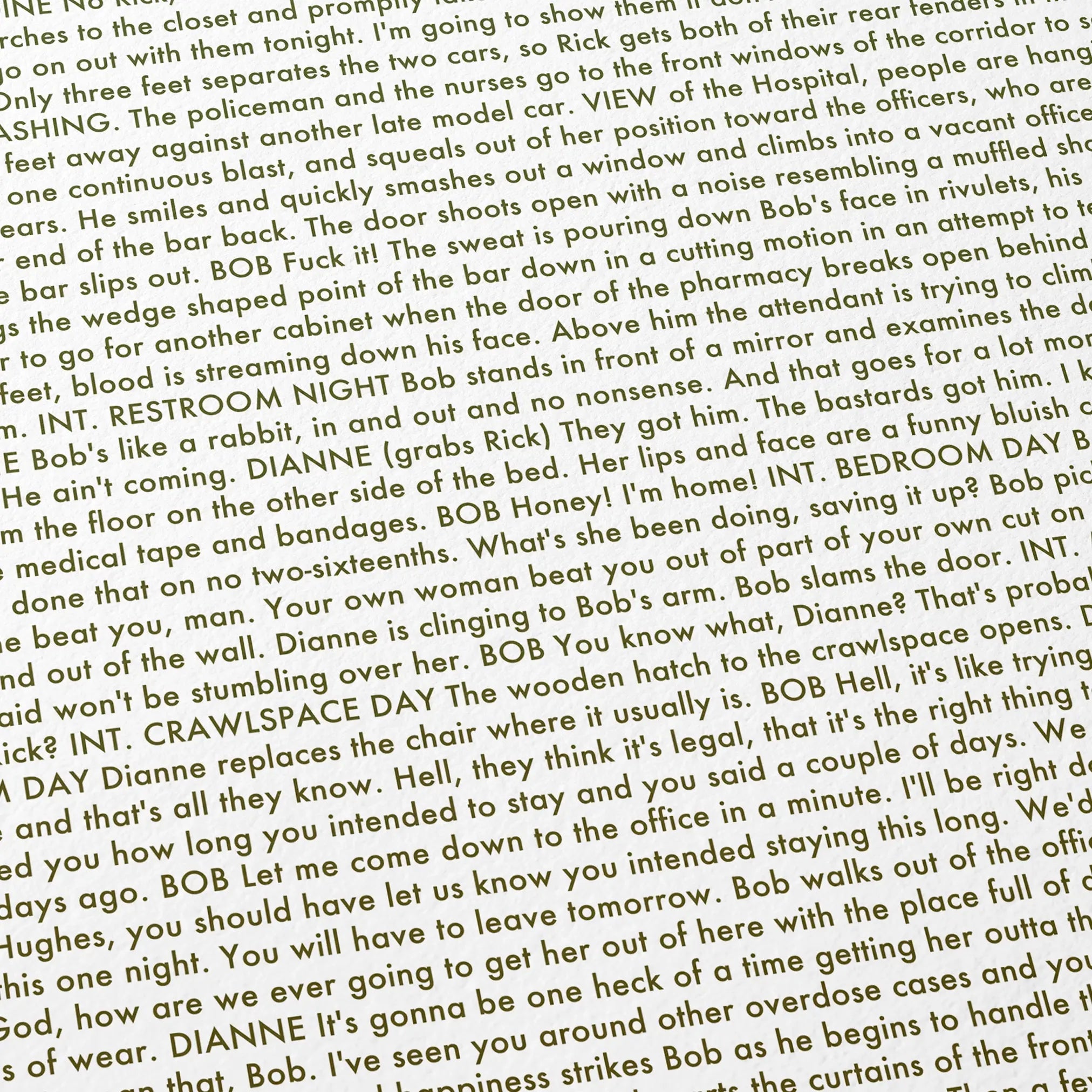 Close-up detail of the Drugstore Cowboy movie script poster showing dense typographic text.