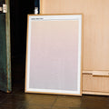 A framed Dune: Part Two movie script poster displayed in a contemporary interior setting.