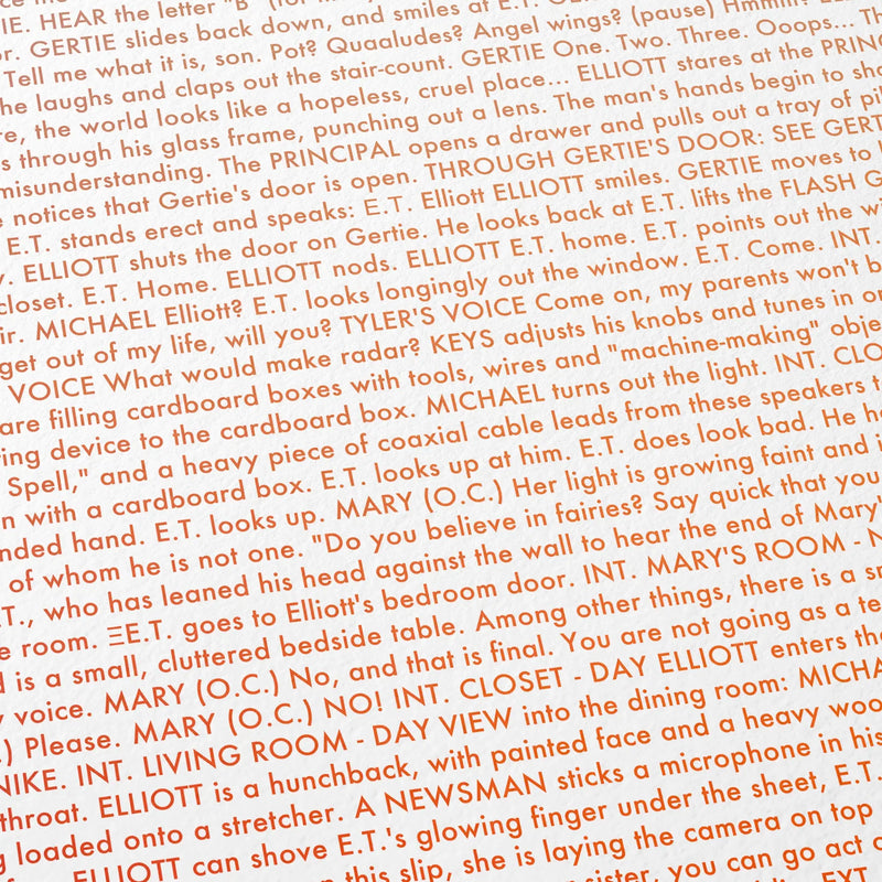Close-up detail of the E.T. the Extra-Terrestrial movie script poster showing dense typographic text.