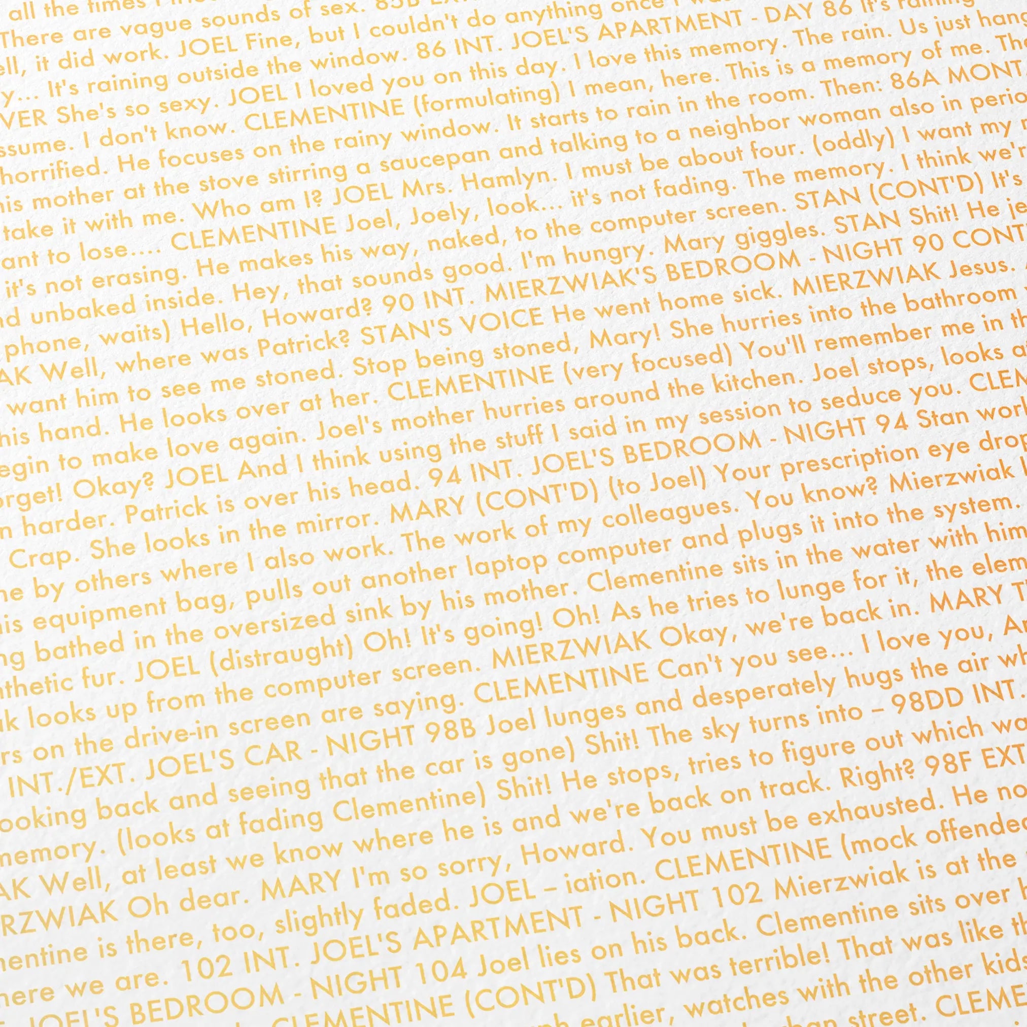 Close-up detail of the Eternal Sunshine of the Spotless Mind movie script poster showing dense typographic text.