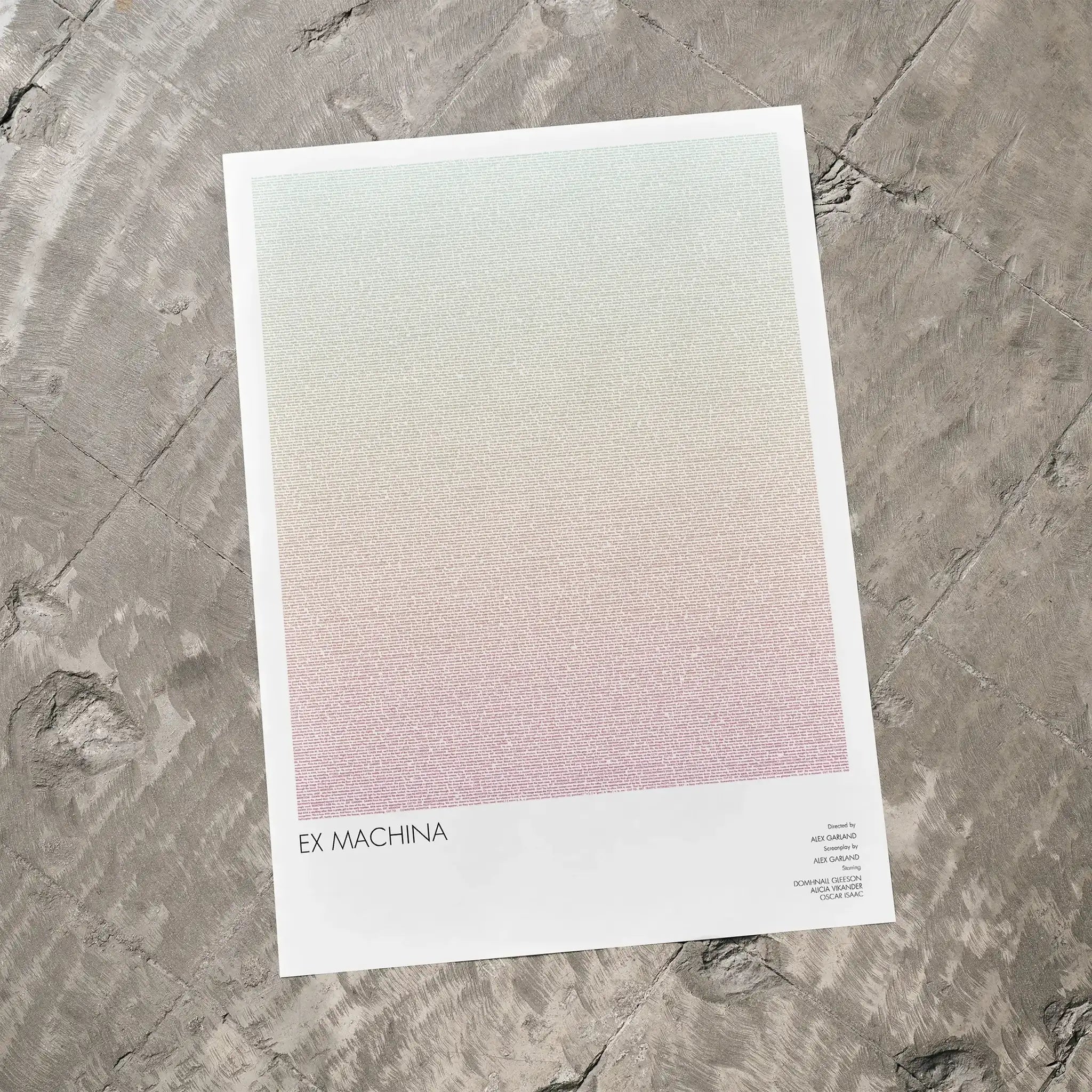 A Ex Machina movie script poster laid flat on a textured floor surface.