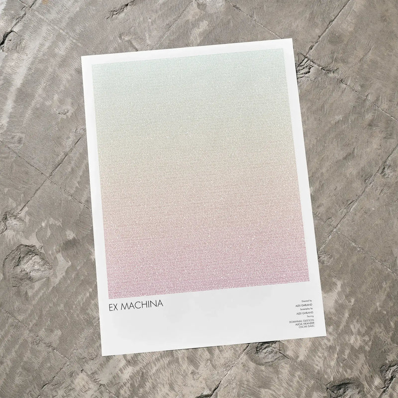 A Ex Machina movie script poster laid flat on a textured floor surface.