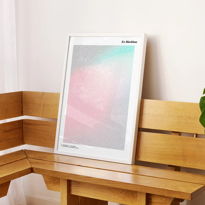 A framed Ex Machina movie script poster displayed on a sideboard in a contemporary space.