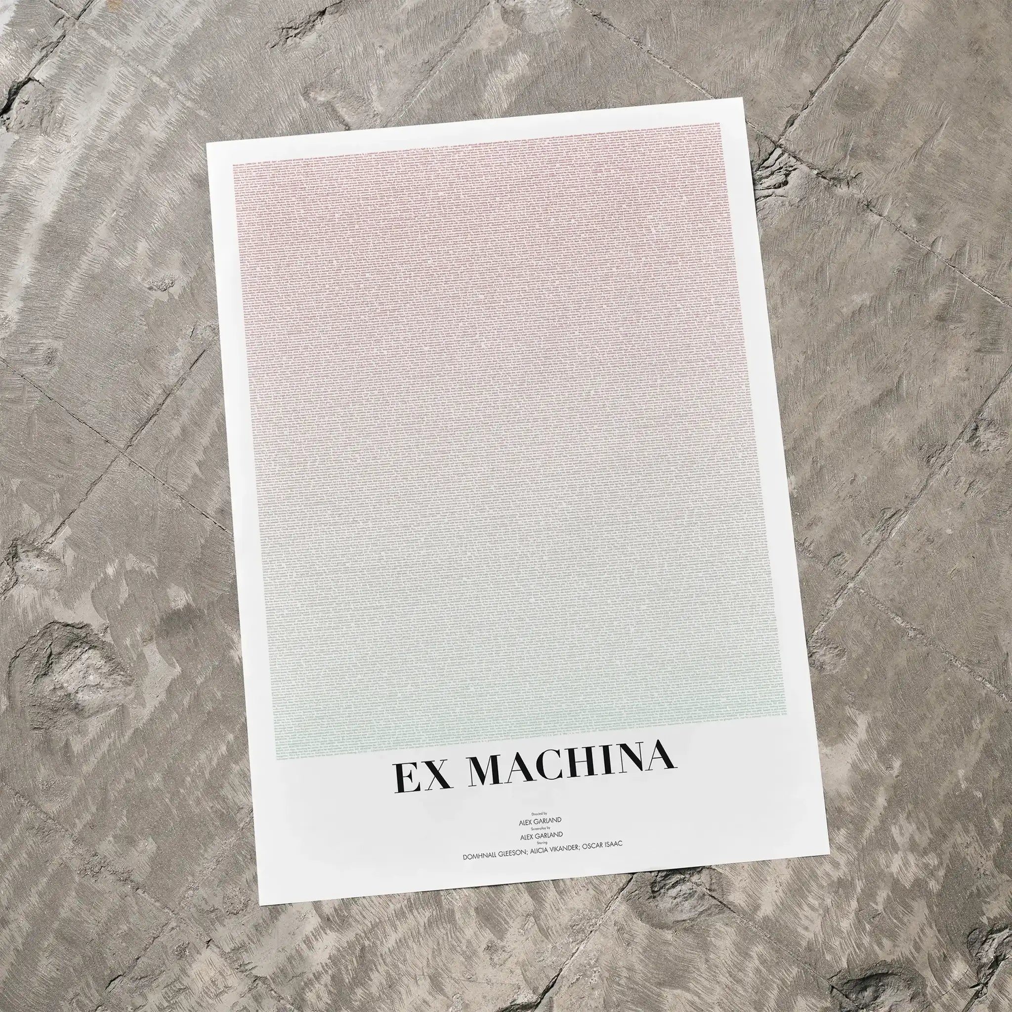 A Ex Machina movie script poster laid flat on a textured floor surface.