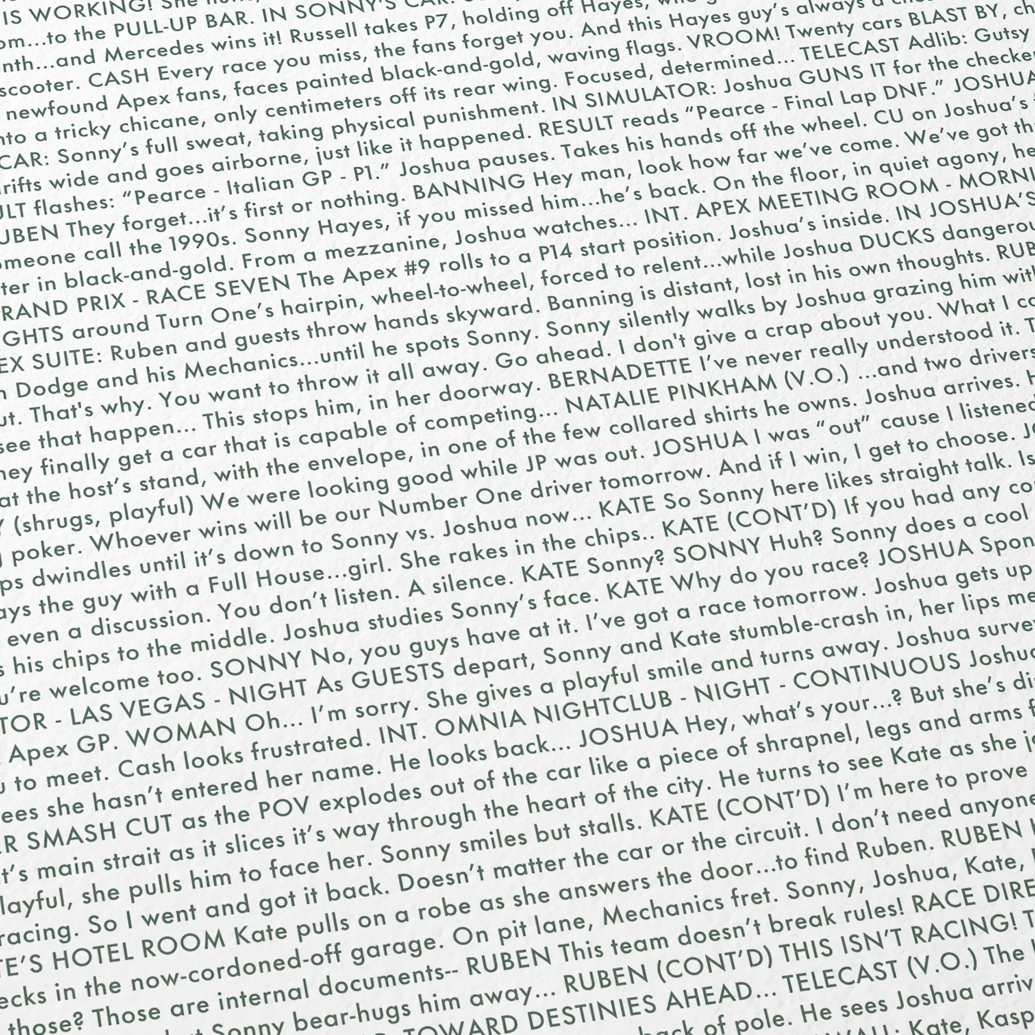 Close-up detail of the F1: The Movie movie script poster showing dense typographic text.