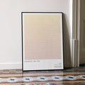 A framed Fantastic Mr. Fox movie script poster leaning against a wall in a minimalist interior.