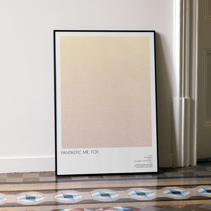 A framed Fantastic Mr. Fox movie script poster leaning against a wall in a minimalist interior.