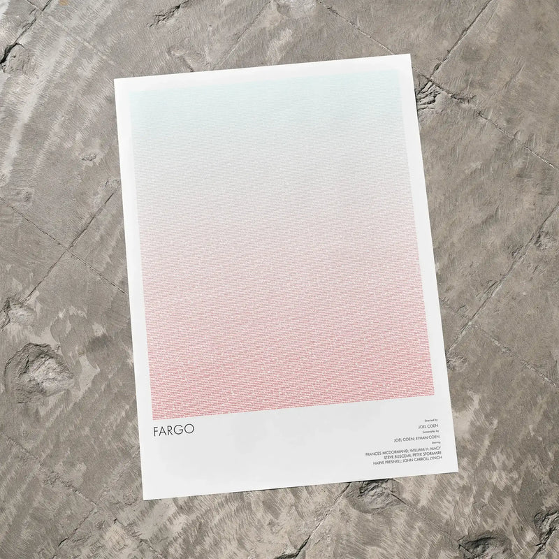 A Fargo movie script poster laid flat on a textured floor surface.