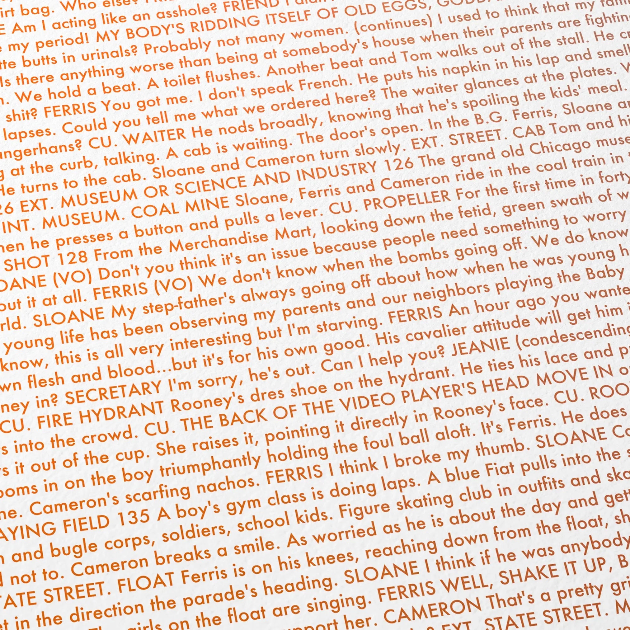 Close-up detail of the Ferris Bueller’s Day Off movie script poster showing dense typographic text.