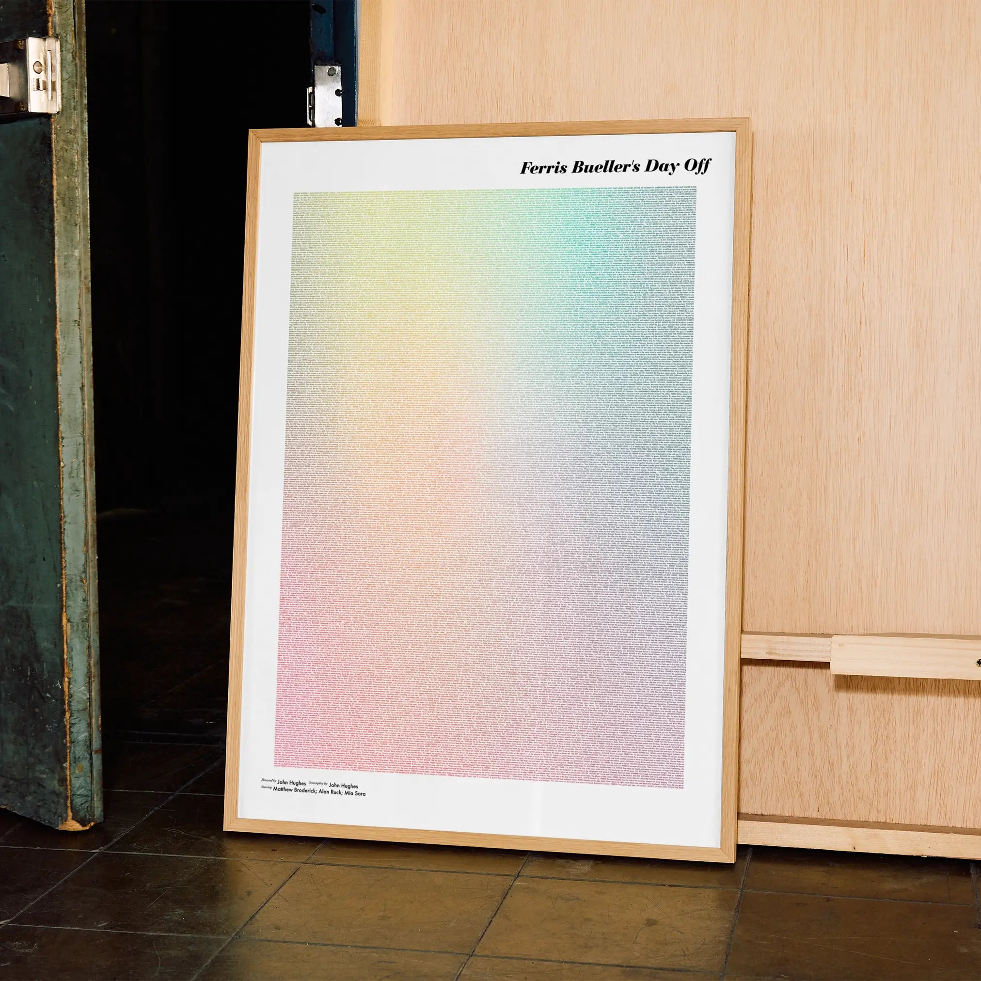 A framed Ferris Bueller’s Day Off movie script poster displayed in a contemporary interior setting.