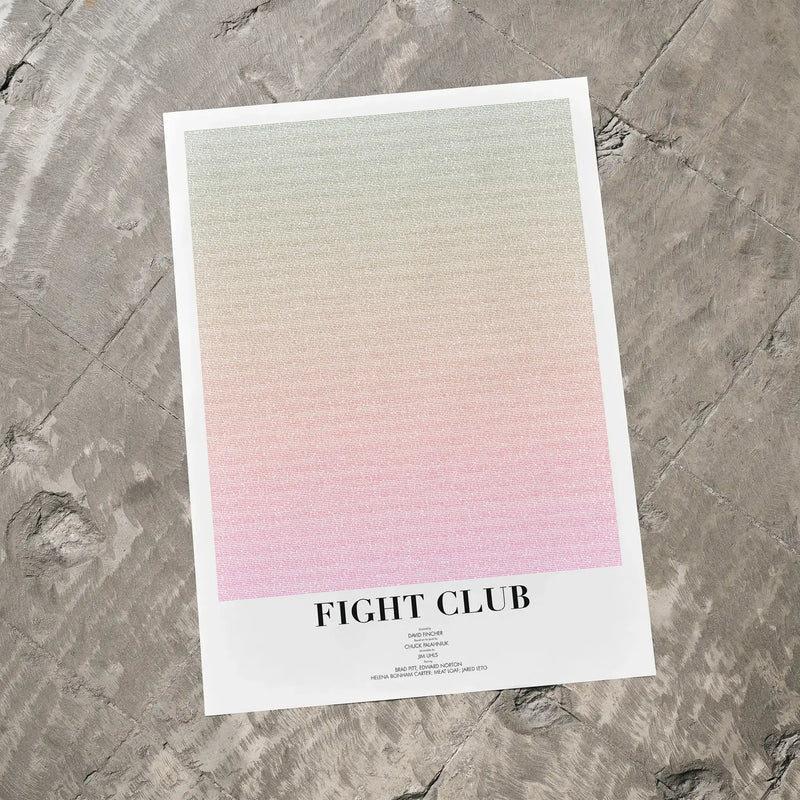 A Fight Club movie script poster laid flat on a textured floor surface.