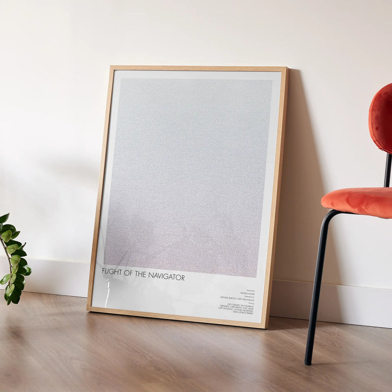 A framed Flight of the Navigator movie script poster placed in a bright interior environment.