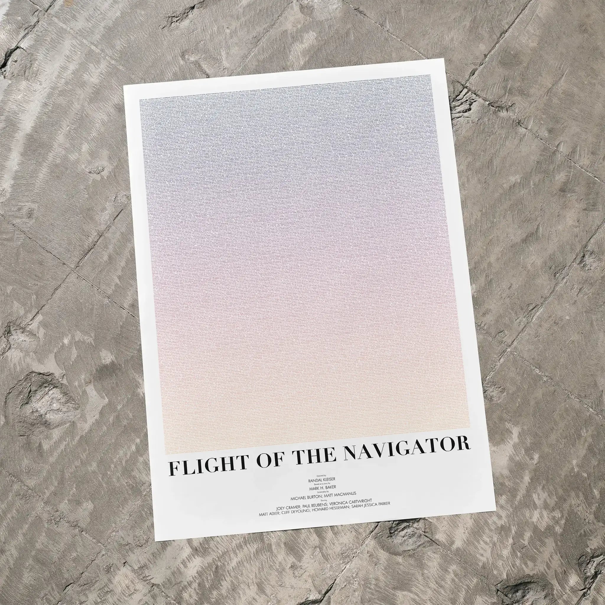 A Flight of the Navigator movie script poster laid flat on a textured floor surface.