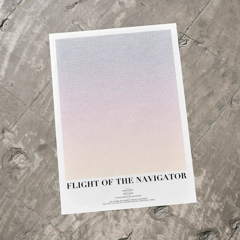 A Flight of the Navigator movie script poster laid flat on a textured floor surface.