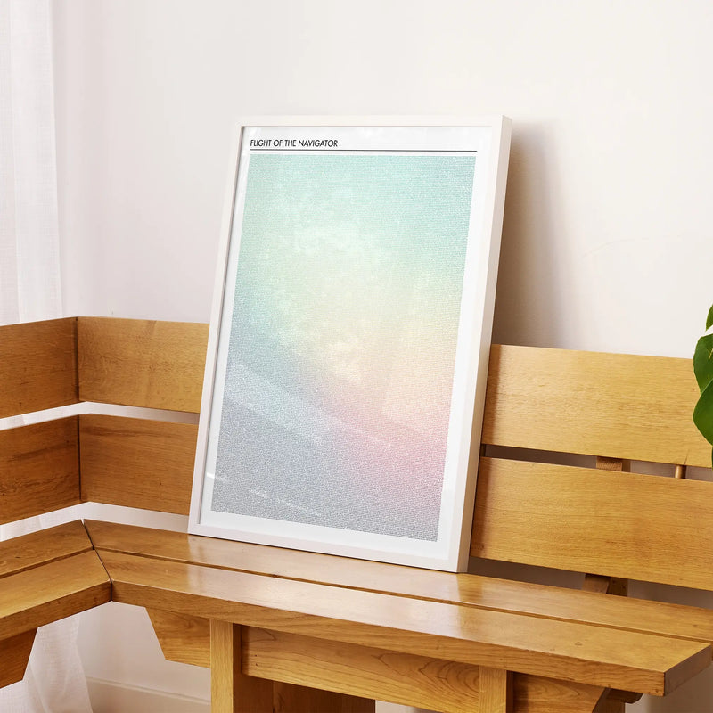 A framed Flight of the Navigator movie script poster displayed on a sideboard in a contemporary space.