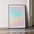 A framed Footloose movie script poster leaning against a wall in a minimalist interior.