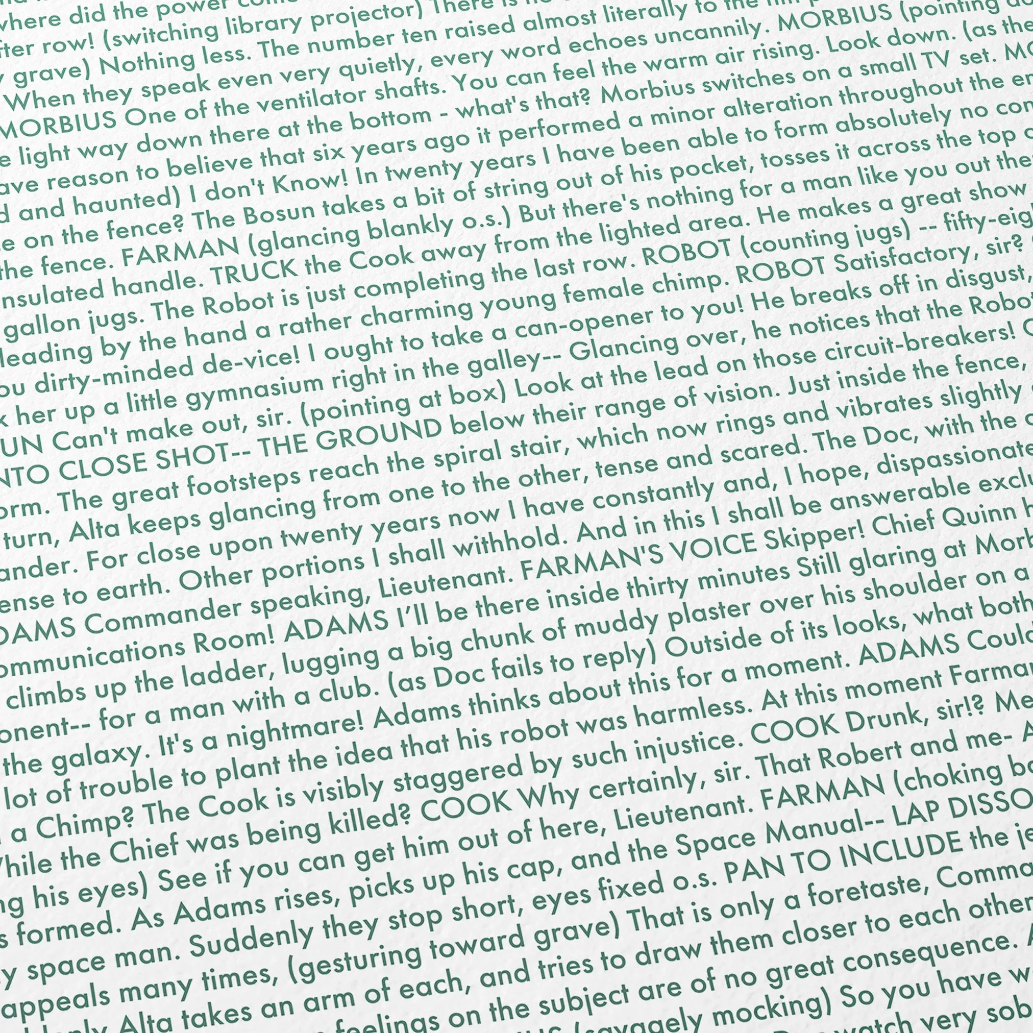 Close-up detail of the Forbidden Planet movie script poster showing dense typographic text.