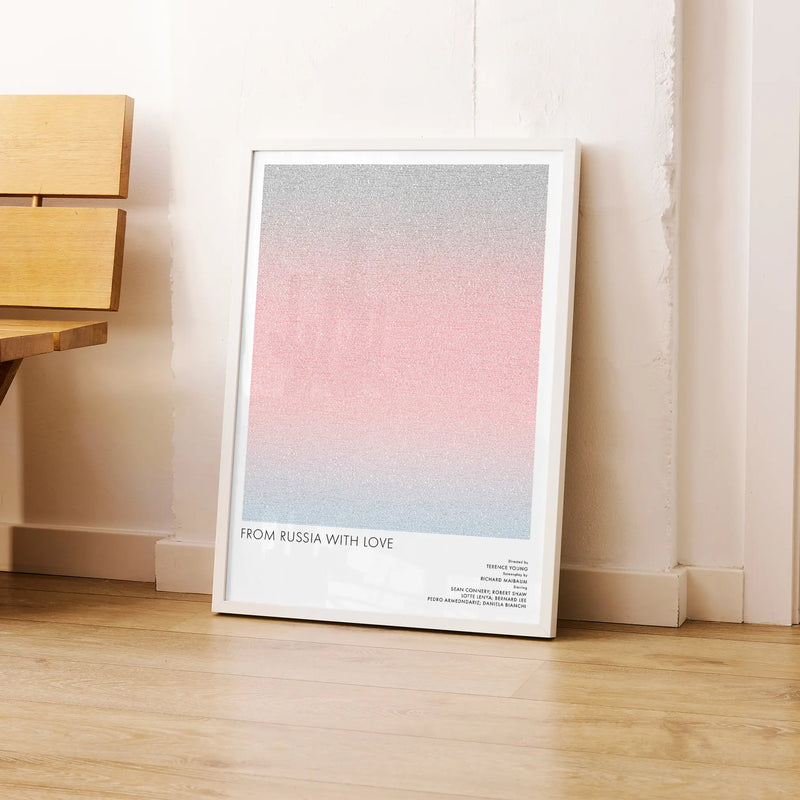 A framed From Russia with Love movie script poster leaning against a wall in a modern interior.