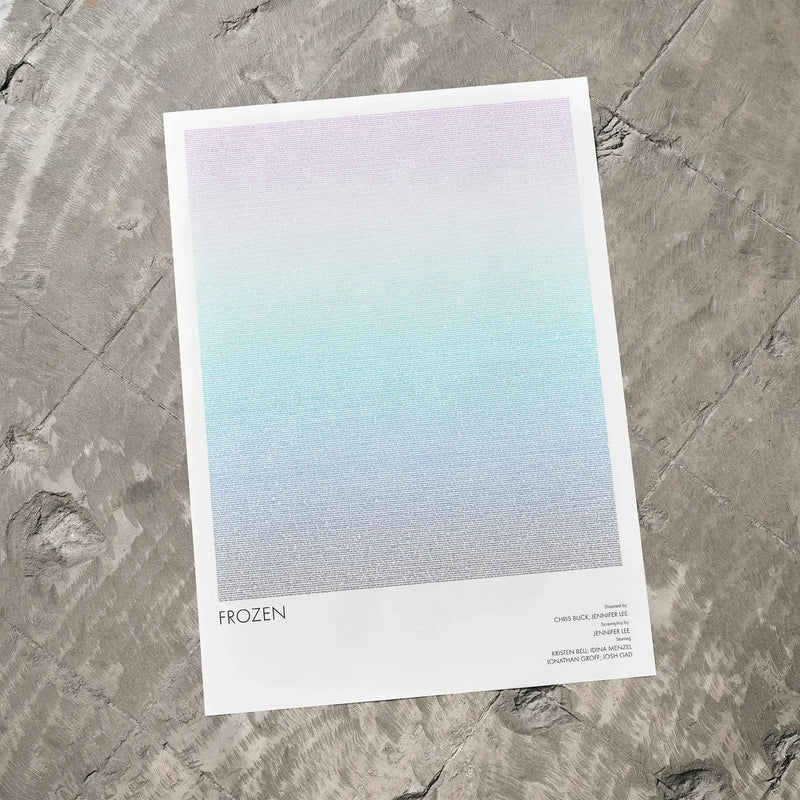 A Frozen movie script poster laid flat on a textured floor surface.