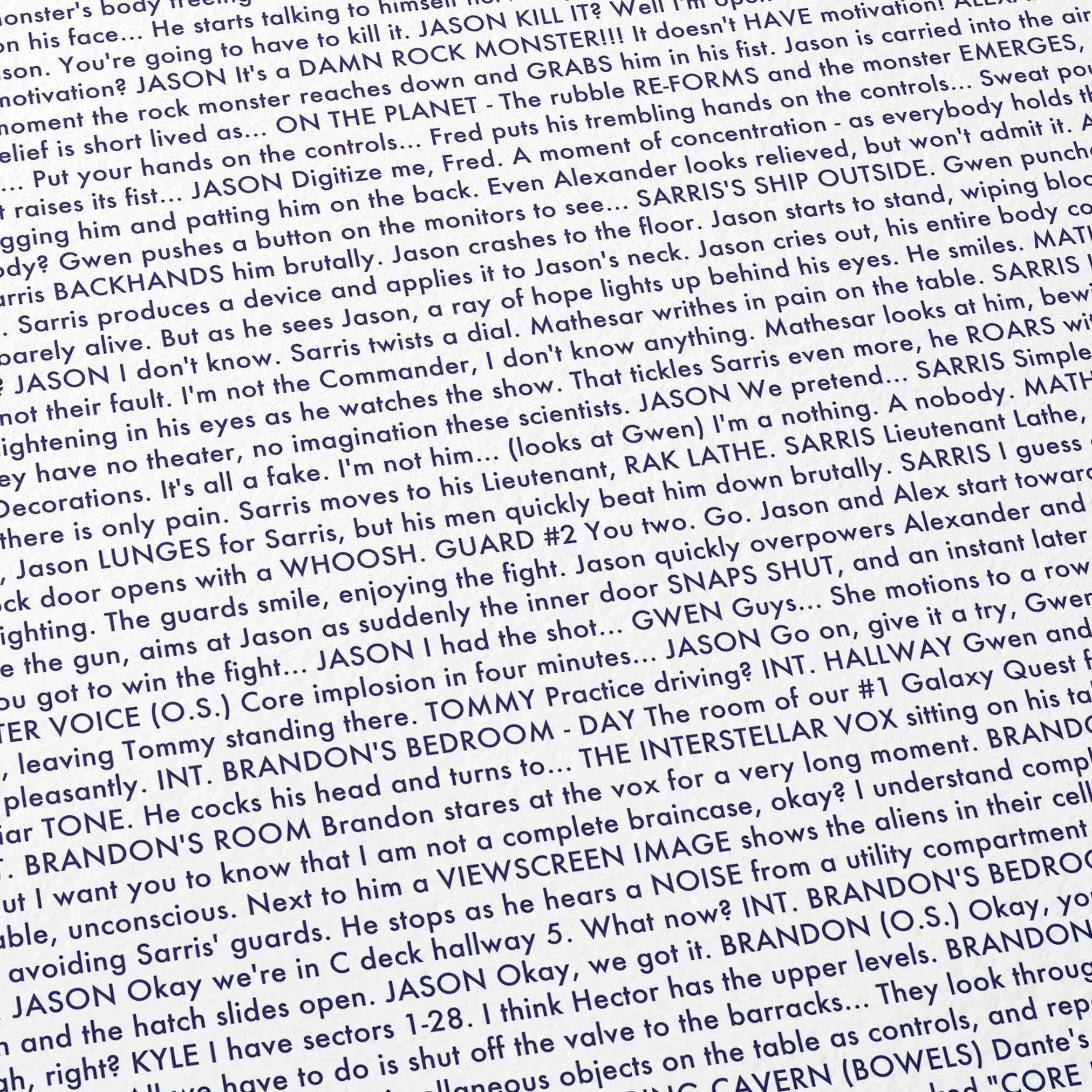 Close-up detail of the Galaxy Quest movie script poster showing dense typographic text.
