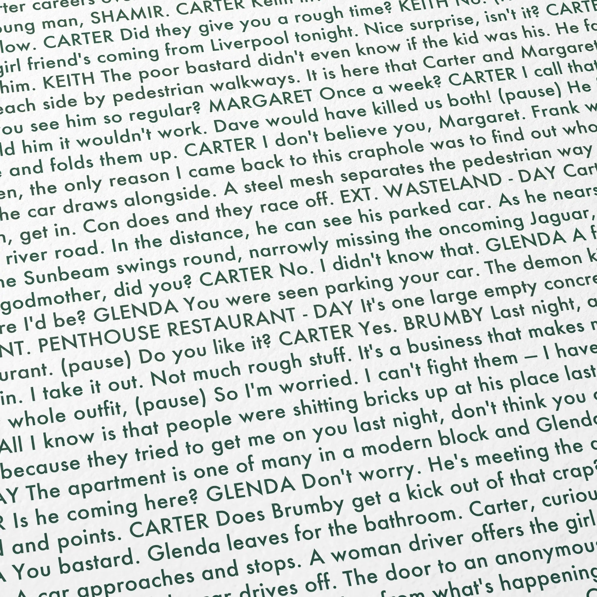 Close-up detail of the Get Carter movie script poster showing dense typographic text.