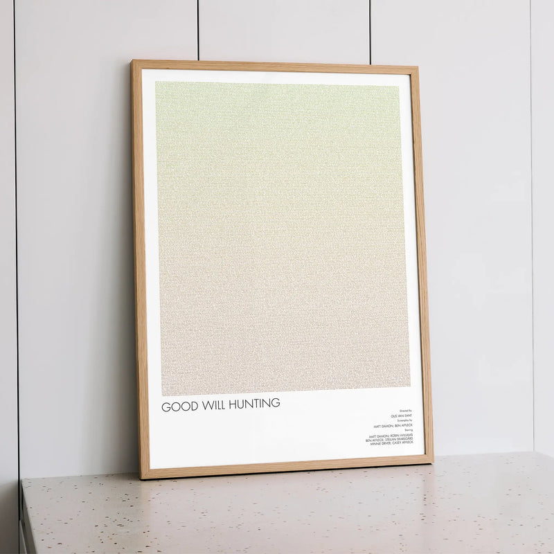 A framed Good Will Hunting movie script poster styled within a calm interior space.