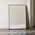 A framed Good Will Hunting movie script poster leaning against a wall in a minimalist interior.