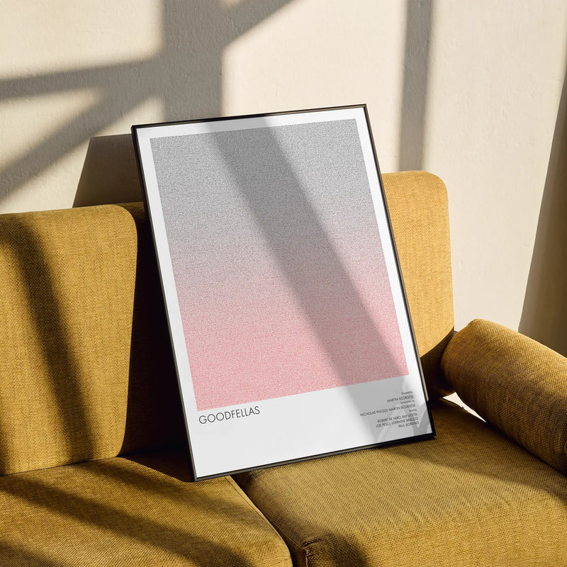 A framed Goodfellas movie script poster styled in a clean interior setting.