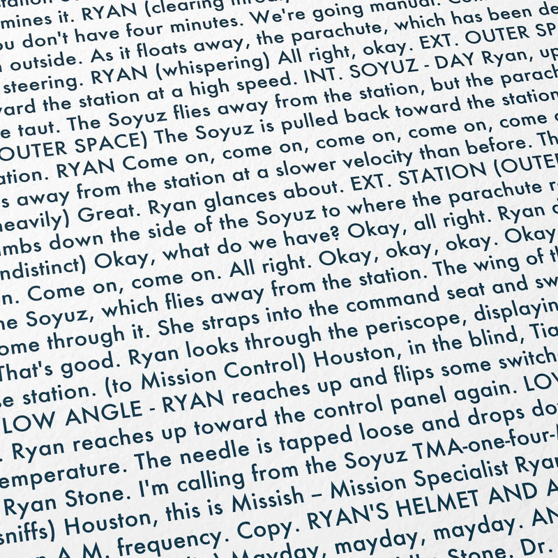 Close-up detail of the Gravity movie script poster showing dense typographic text.