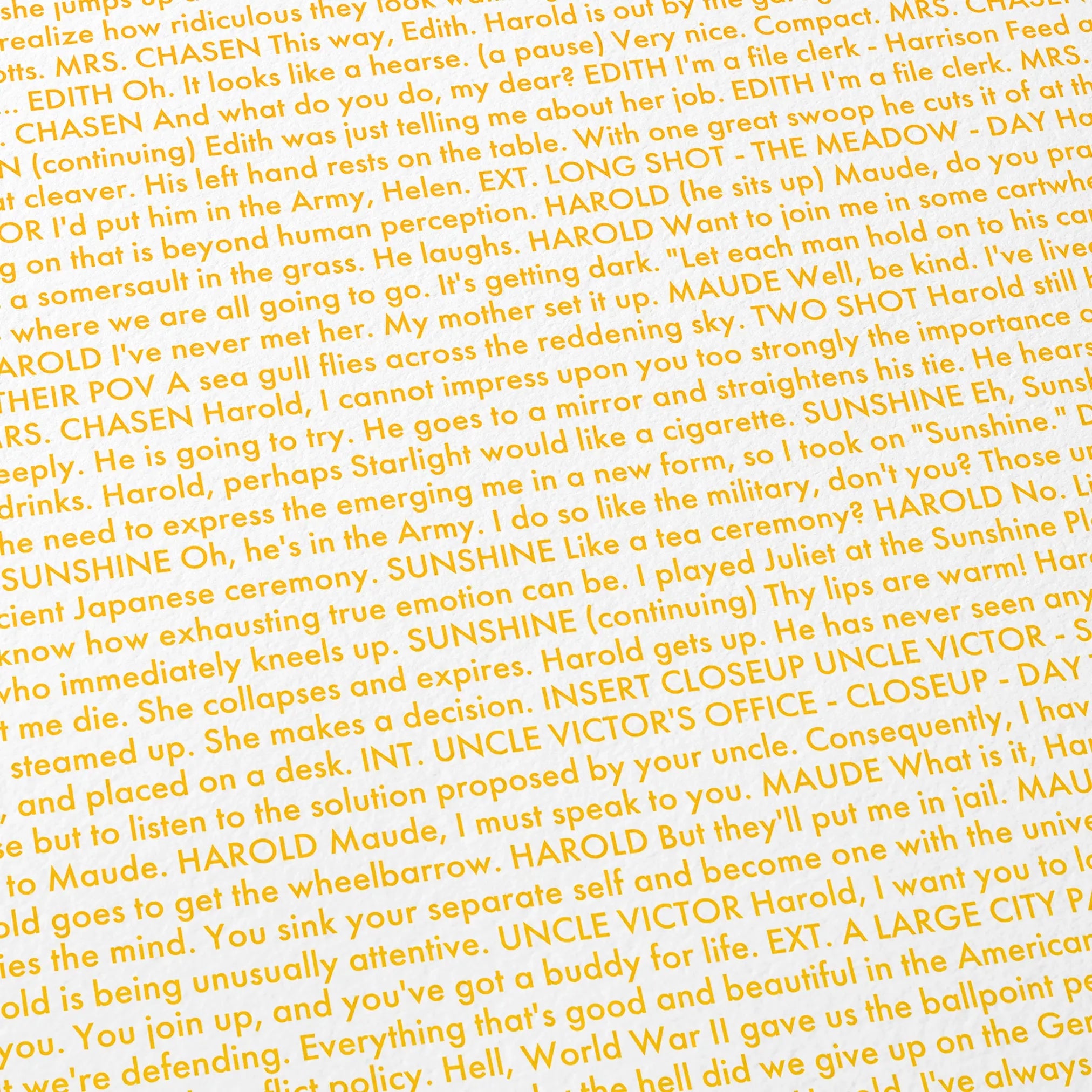 Close-up detail of the Harold and Maude movie script poster showing dense typographic text.