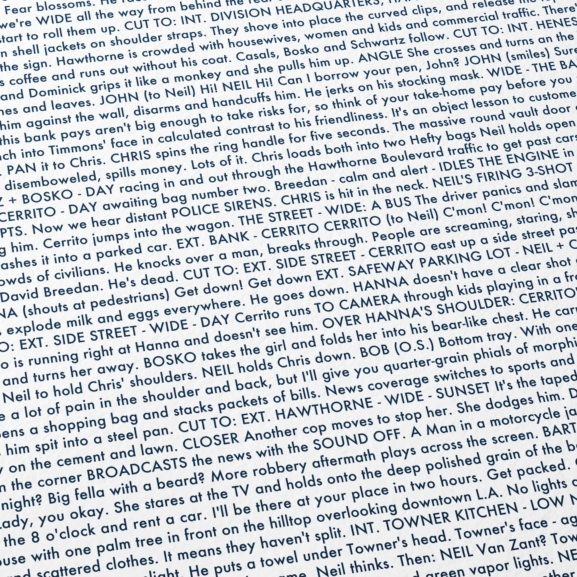 Close-up detail of the Heat movie script poster showing dense typographic text.
