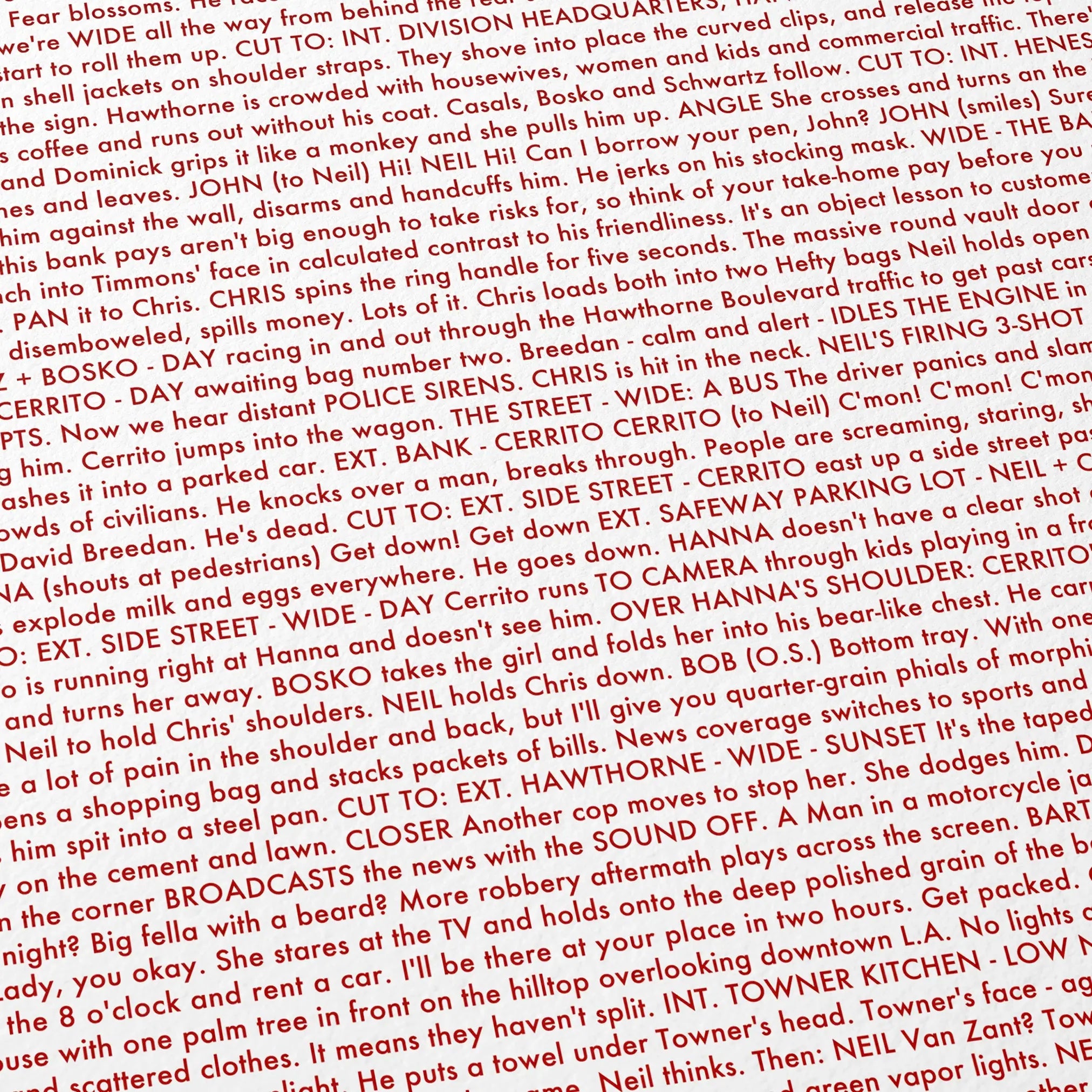 Close-up detail of the Heat movie script poster showing dense typographic text.