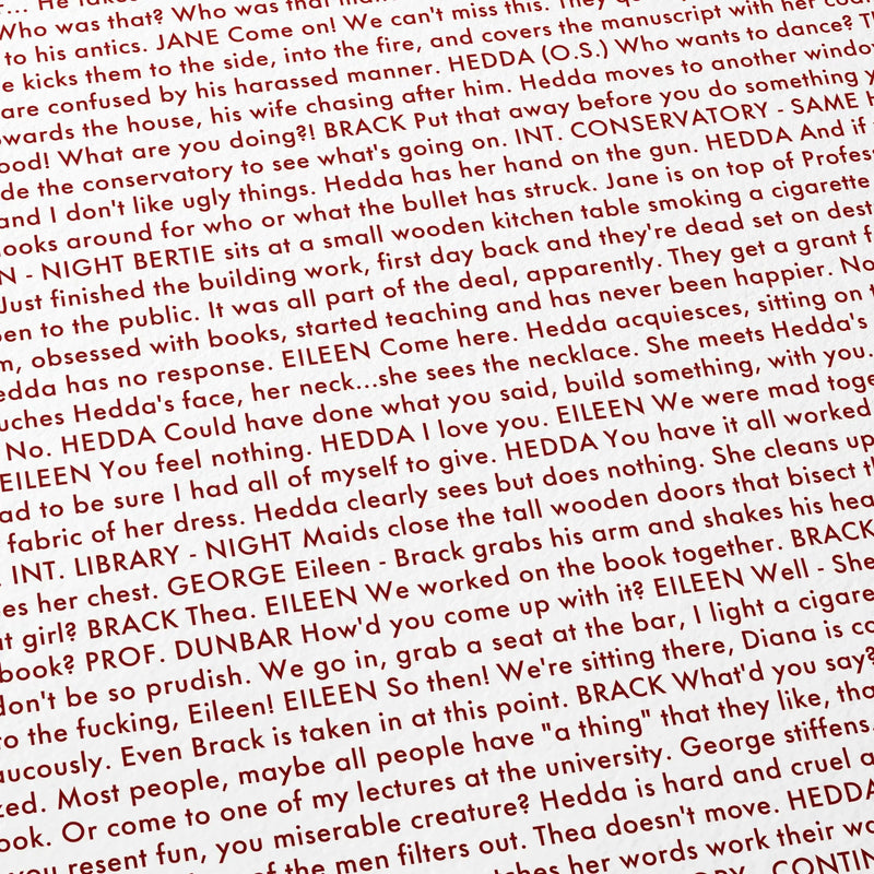 Close-up detail of the Hedda movie script poster showing dense typographic text.