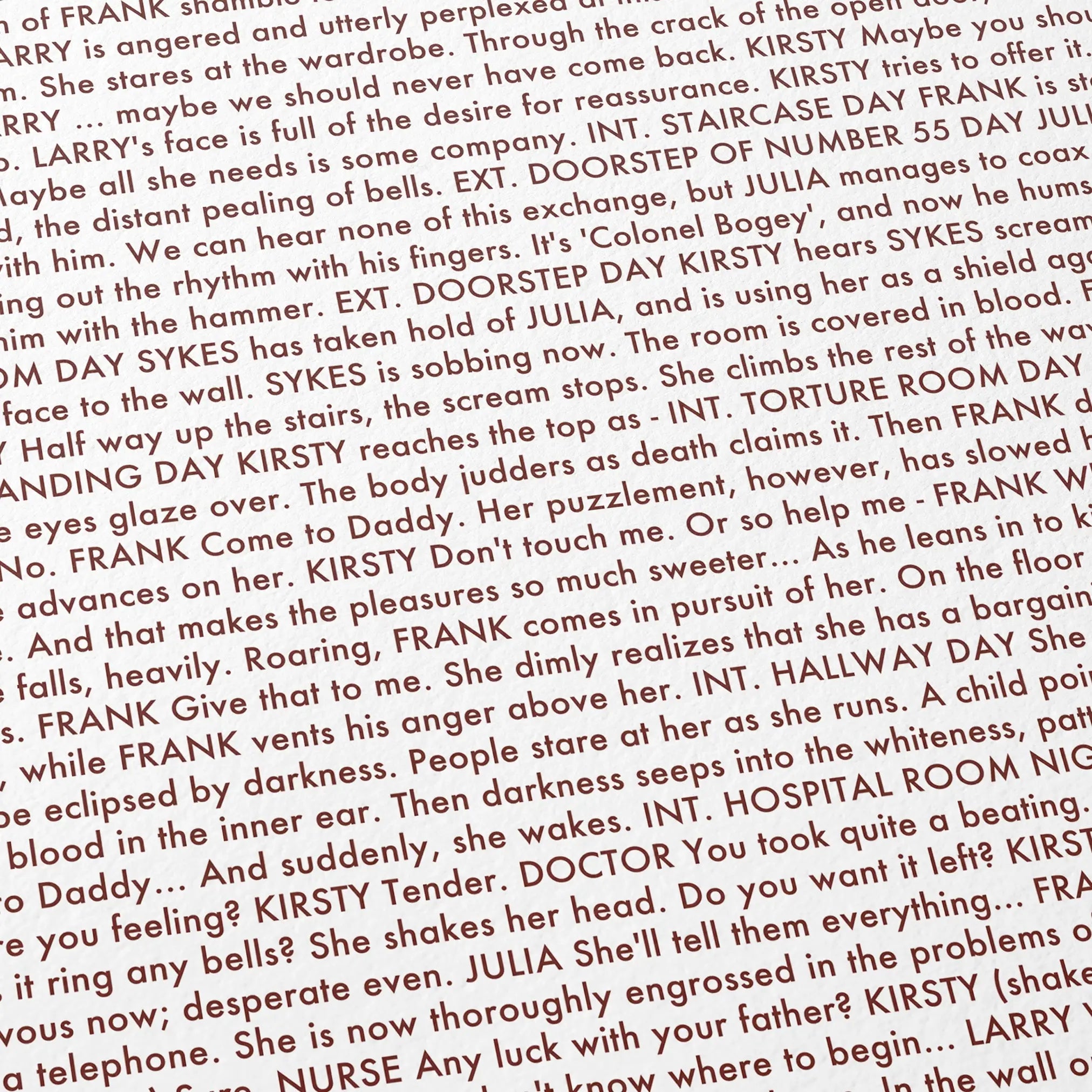 Close-up detail of the Hellraiser movie script poster showing dense typographic text.