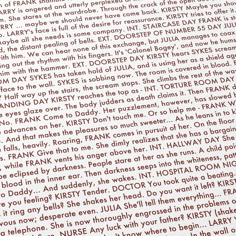 Close-up detail of the Hellraiser movie script poster showing dense typographic text.